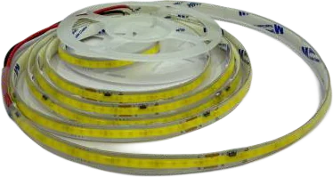 A coil of round silicone-jacketed COB rope light on a white spool, its continuous warm emitter line facing outward