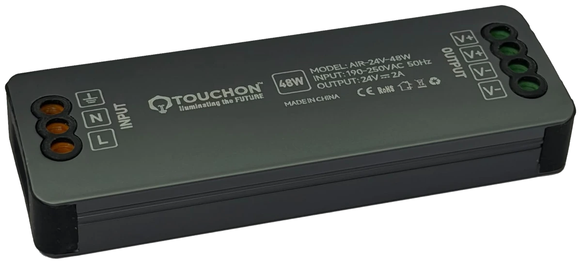 A slim profile constant-voltage LED air driver in a dark casing with TOUCHON branding, input screw terminals on the left and output terminals on the right