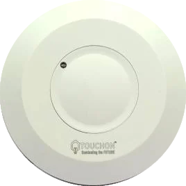 A shallow circular white ceiling sensor with a plain domed face and a small indicator LED at its edge