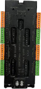 A black stair-controller board seen from above, its two banks of terminals flanking a central module