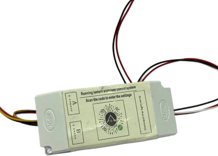 A small white potted controller module with an adjustment dial on its face and bare flying leads at both ends
